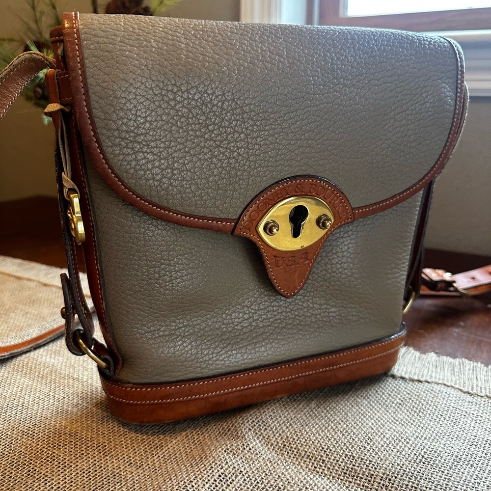 Dooney & Bourke Cavalry Spectator crossbody bag.